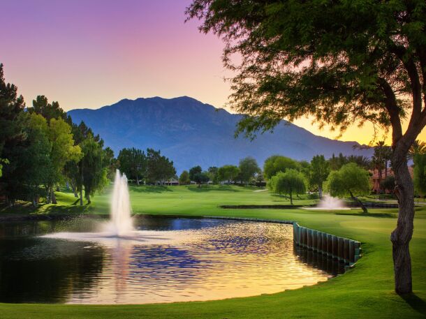 Fountain in pond on golf course