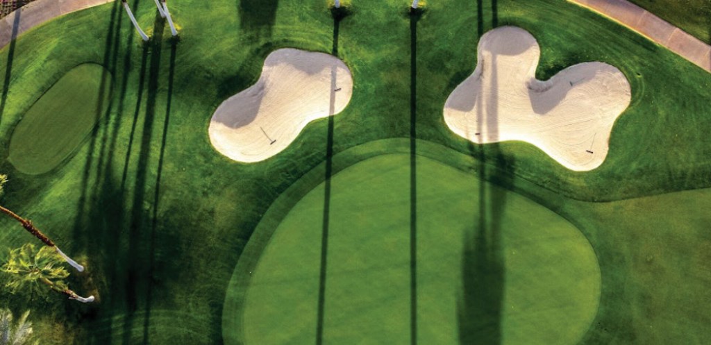 Aerial view of golf course with bunkers